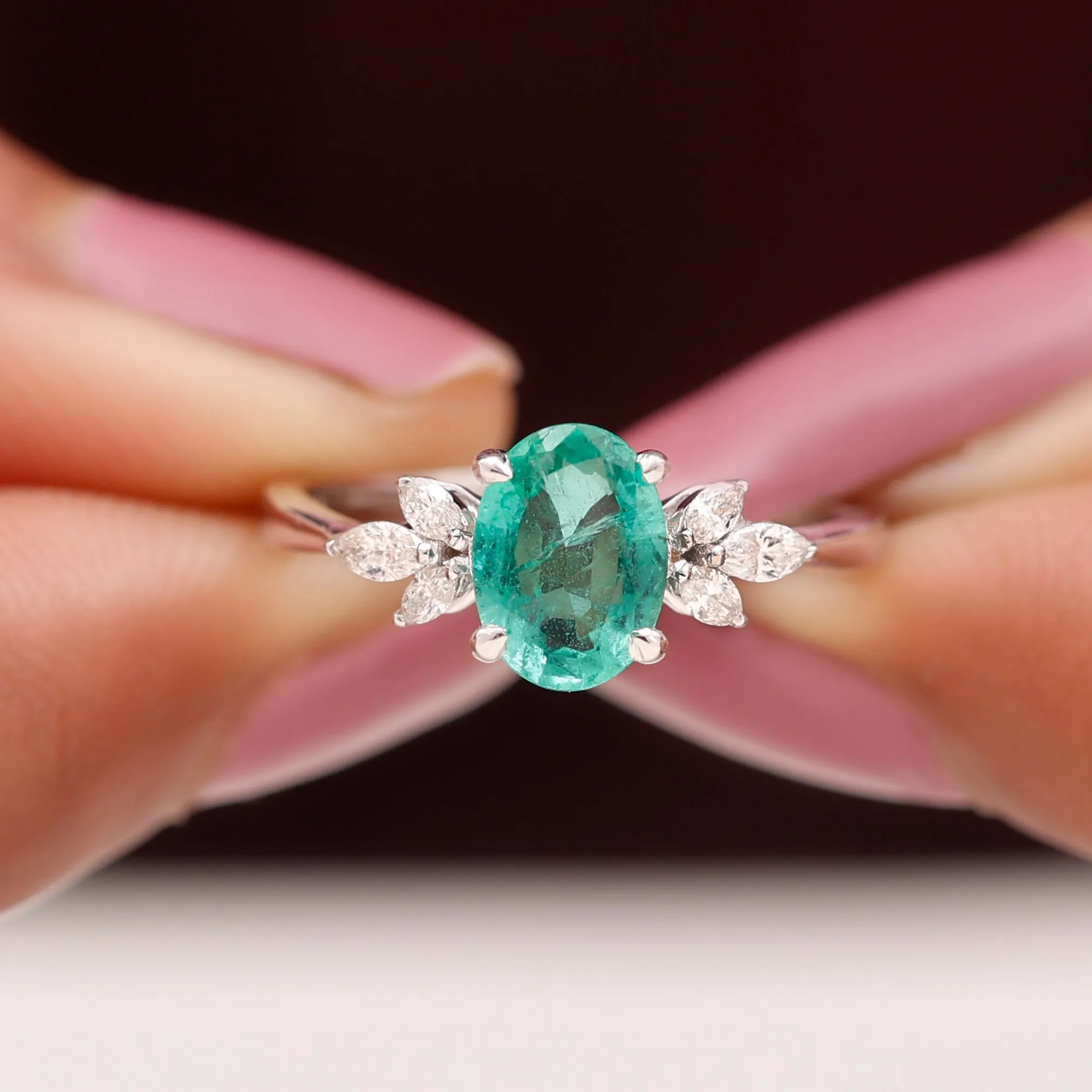 1.50 CT Claw Set Oval shape Emerald Solitaire and Marquise Diamond Trio Ring