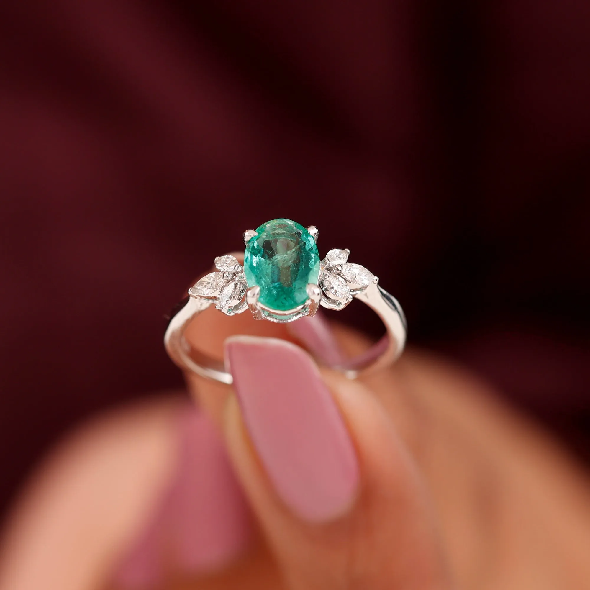 1.50 CT Claw Set Oval shape Emerald Solitaire and Marquise Diamond Trio Ring