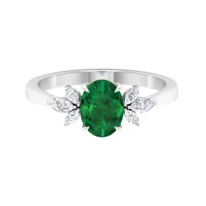 1.50 CT Claw Set Oval shape Emerald Solitaire and Marquise Diamond Trio Ring