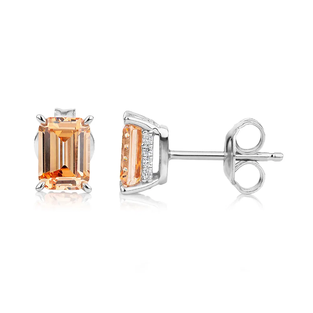 Emerald Cut and Round Brilliant stud earrings with 2.24 carats* of diamond simulants in sterling silver